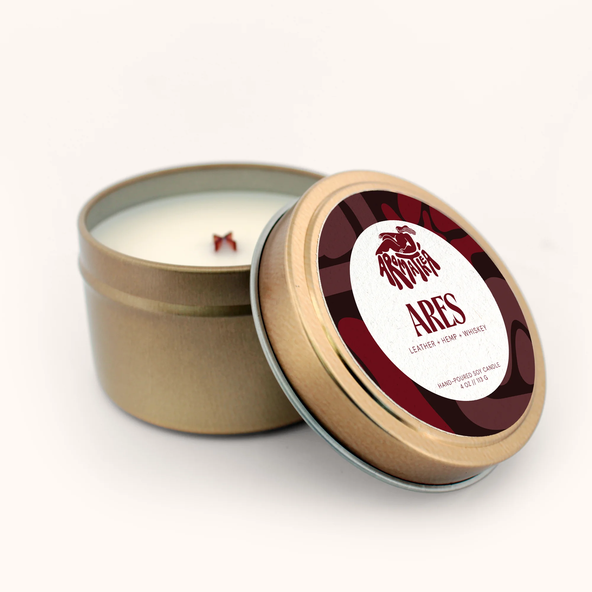 Candle in a tin labeled "Ares" on a white background