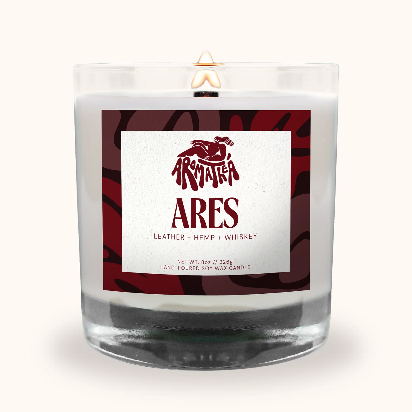 Candle with a label featuring the brand 'Ares' on a white background