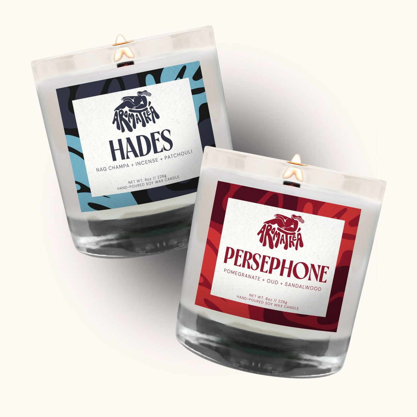 Two candles with labels 'Hades' and 'Persephone' on a white background